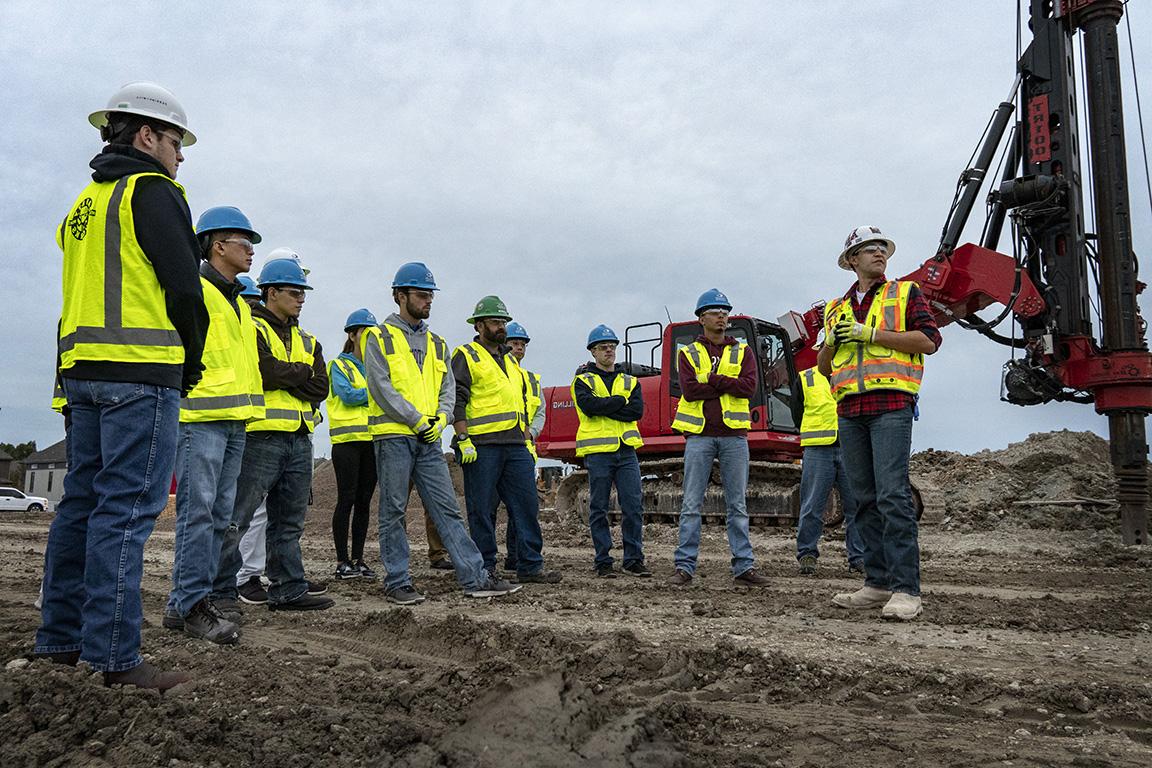 Members of the Collin College Construction Management class stand on the site of the Technical Campus in 2019